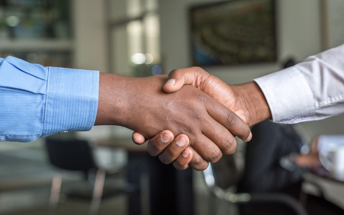 Partners joining hands on a transaction